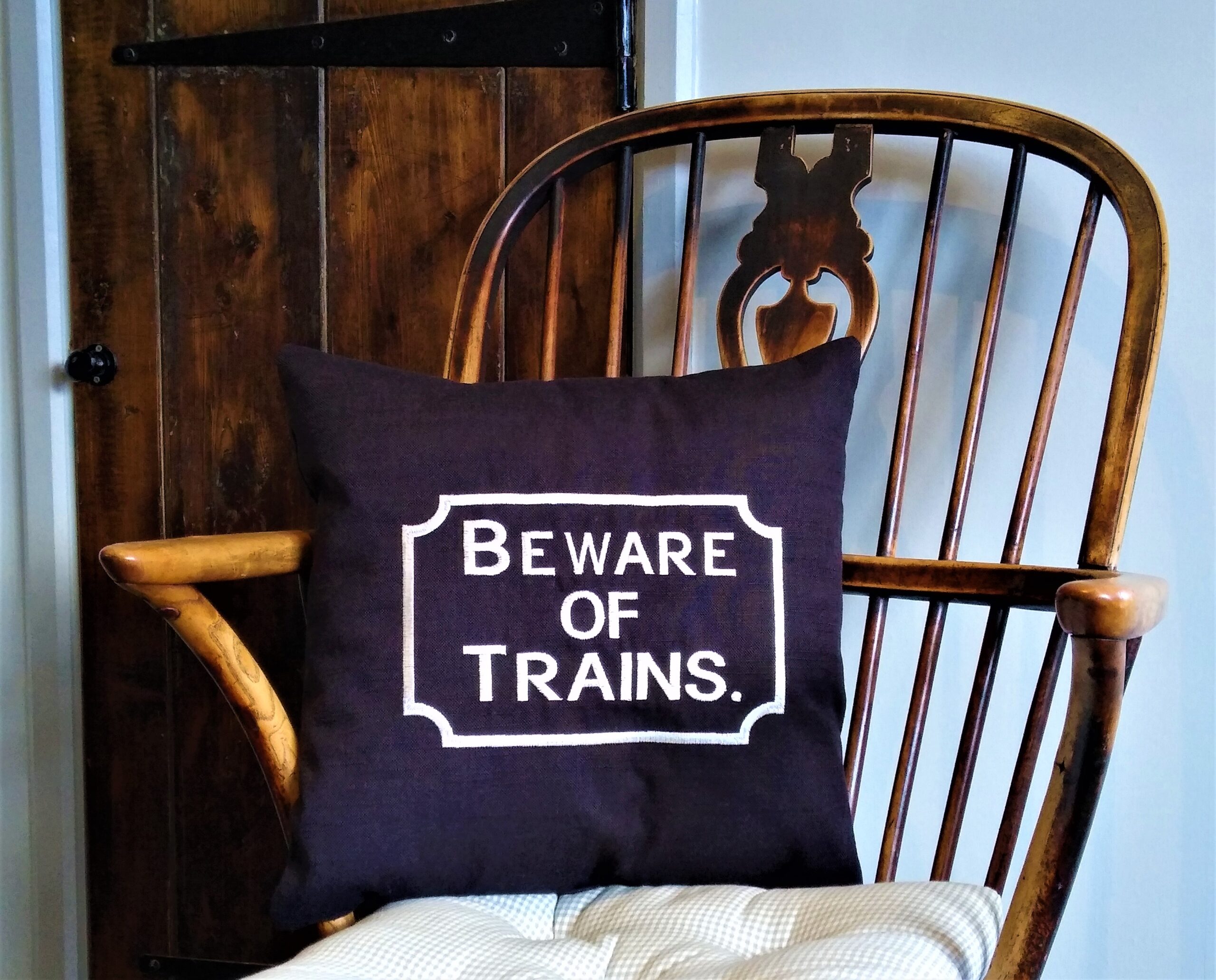 Black Beware of the Trains scatter cushion